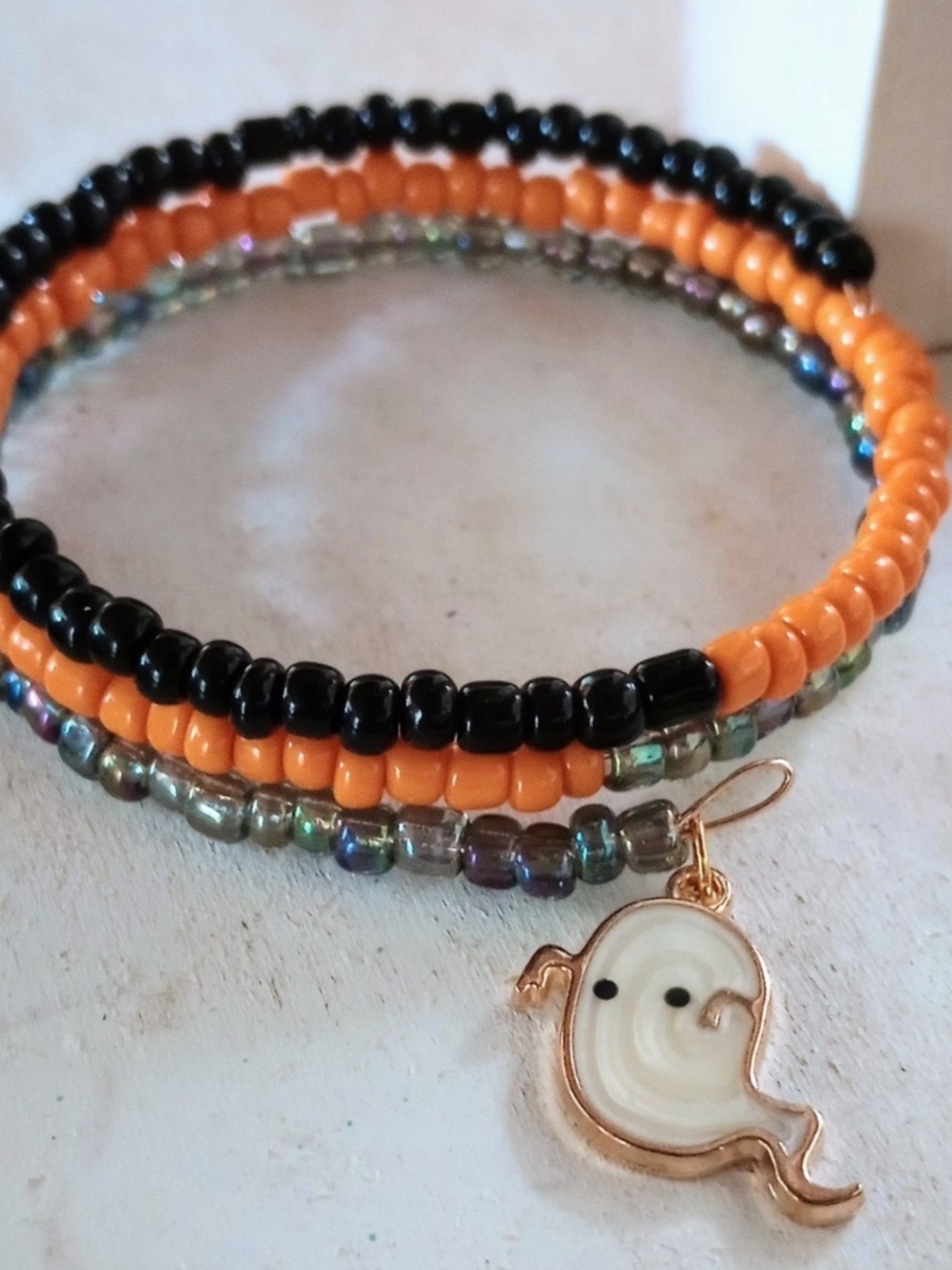 Handcrafted Orange & Black Beaded Wrap Bracelet with Ghost Charm